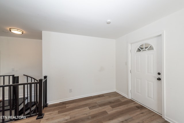 foyer entrance featuring dark hardwood / wood-style flooring