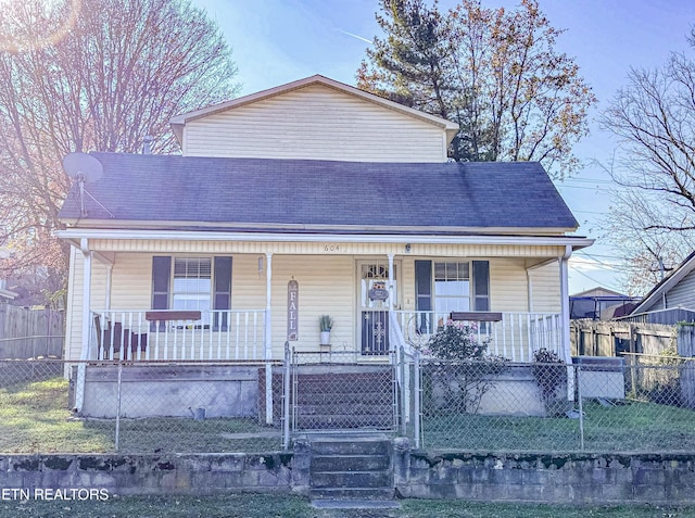 view of front of property featuring covered porch