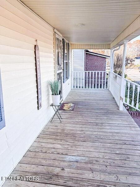 wooden deck with covered porch