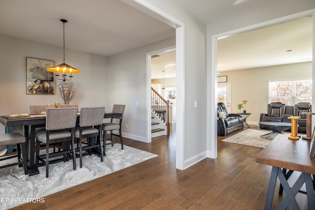 dining room featuring dark wood-type flooring