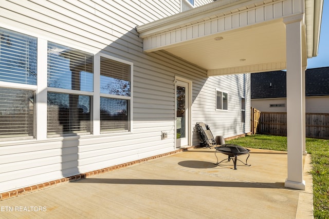 view of patio featuring an outdoor fire pit