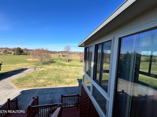 exterior space with a rural view and a patio