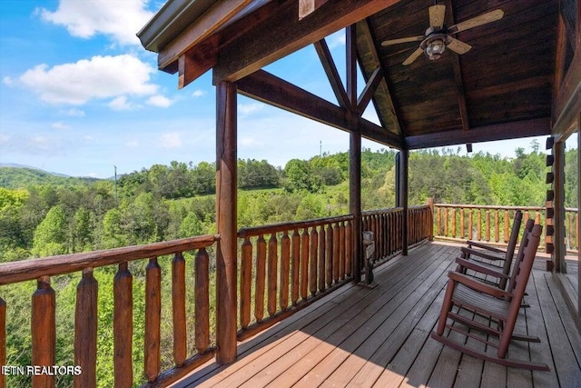 wooden deck with ceiling fan