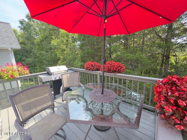 wooden deck with grilling area