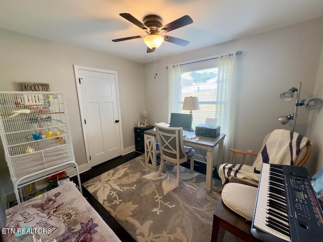 home office with ceiling fan and wood-type flooring