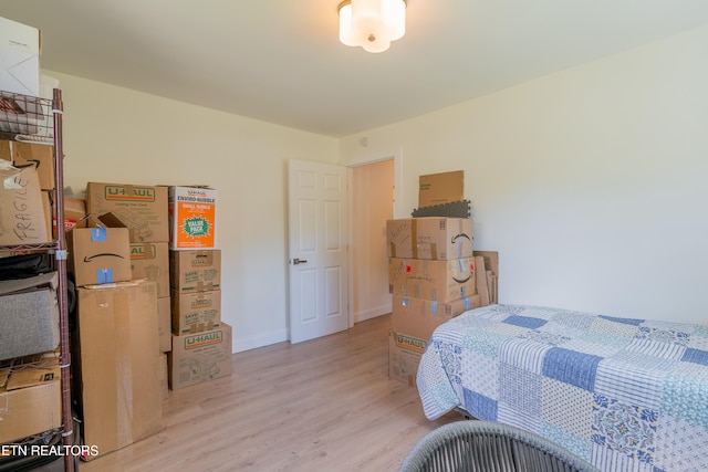 bedroom with light wood-type flooring