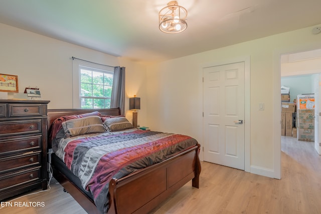 bedroom featuring light wood-type flooring