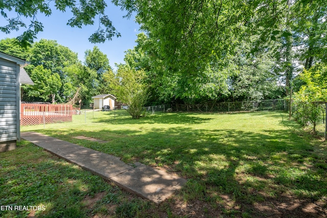 view of yard with a deck