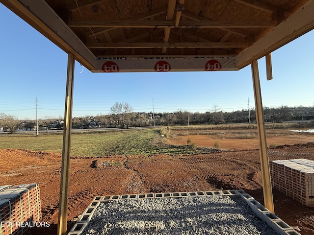 view of yard with a rural view