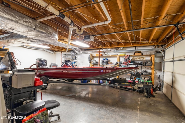 garage featuring a garage door opener