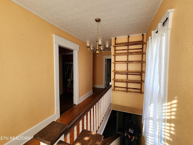 interior space with hardwood / wood-style floors and an inviting chandelier