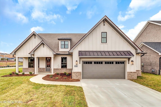 12033 Deer Crossing Dr, Knoxville, TN 37932 - view of front facade featuring board and batten siding, brick siding, and driveway