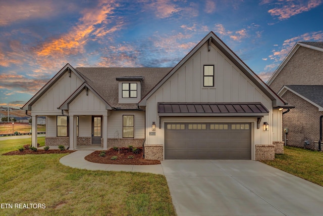12033 Deer Crossing Dr, Knoxville, TN 37932 - view of front of property with board and batten siding, brick siding, concrete driveway, and a lawn