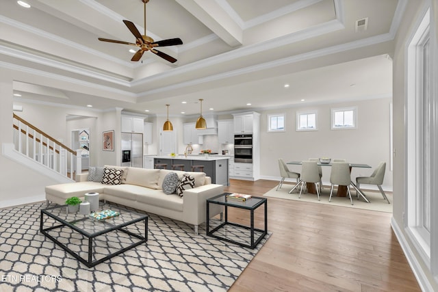 12033 Deer Crossing Dr, Knoxville, TN 37932 - living area featuring stairway, a ceiling fan, hardwood / wood-style floors, crown molding, and recessed lighting
