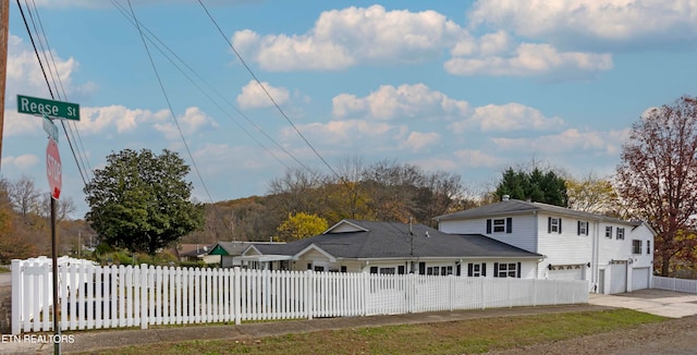 front of property with a garage