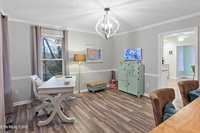 office space with crown molding, wood finished floors, a chandelier, and a textured ceiling