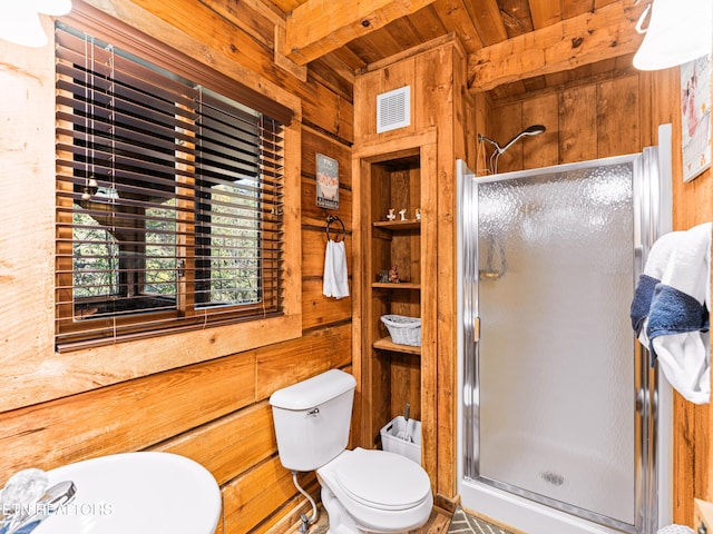 bathroom featuring wood ceiling, wooden walls, beam ceiling, toilet, and a shower with shower door