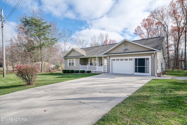 ranch-style home featuring covered porch, a front yard, and a garage