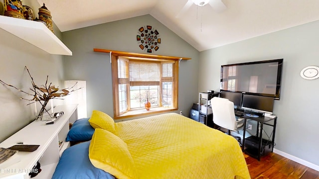 bedroom with dark hardwood / wood-style floors, ceiling fan, and lofted ceiling