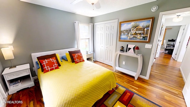 13 Windsor Pt, Crossville, TN 38558 - bedroom with a closet, wood finished floors, and a ceiling fan