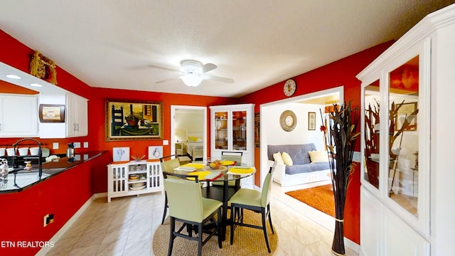 13 Windsor Pt, Crossville, TN 38558 - dining room featuring a ceiling fan and light marble finish flooring