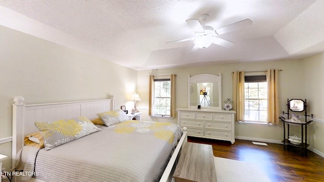 13 Windsor Pt, Crossville, TN 38558 - bedroom with dark wood-type flooring, ceiling fan, and a textured ceiling