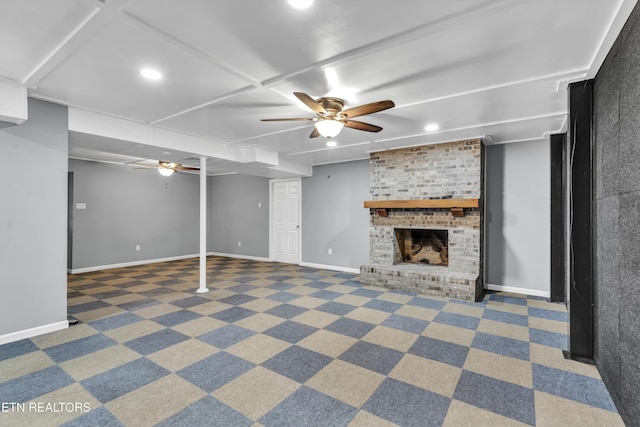 basement featuring dark carpet and a fireplace