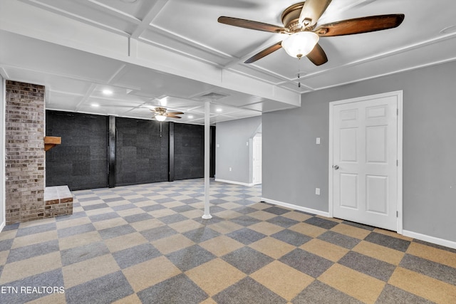 basement with carpet flooring and ceiling fan