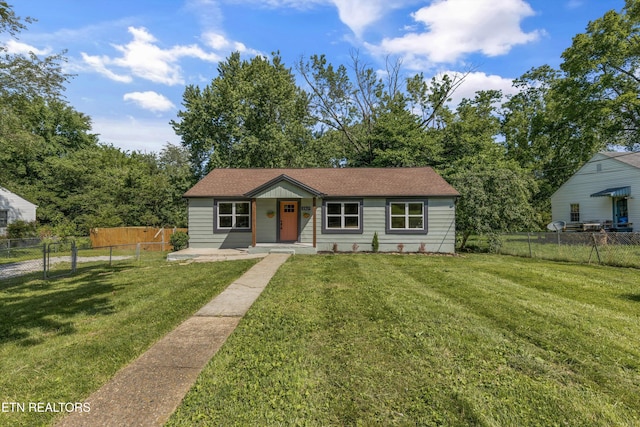 view of front of home with a front yard