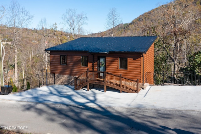 log-style house with a mountain view