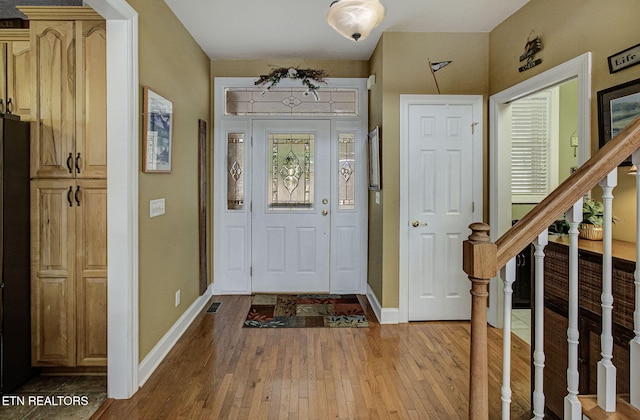 foyer entrance featuring light hardwood / wood-style floors