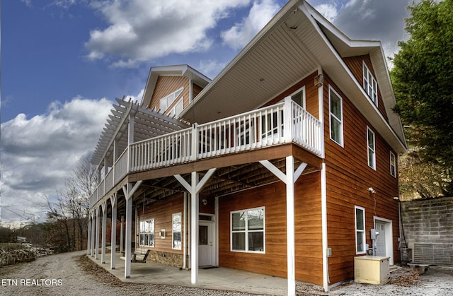 exterior space featuring a patio area and a deck