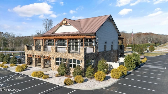 view of property exterior featuring a balcony