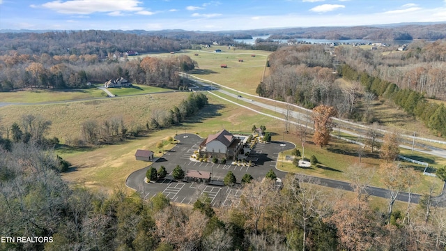 birds eye view of property featuring a rural view