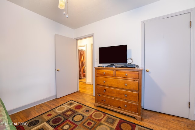 bedroom with light wood-type flooring