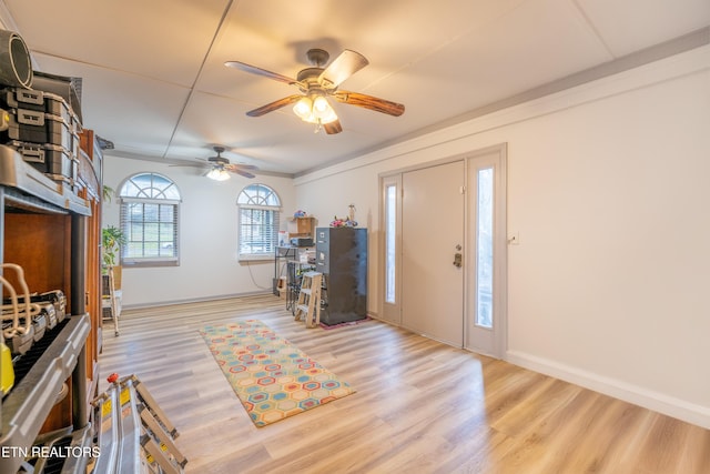 entryway featuring ceiling fan and light wood-type flooring