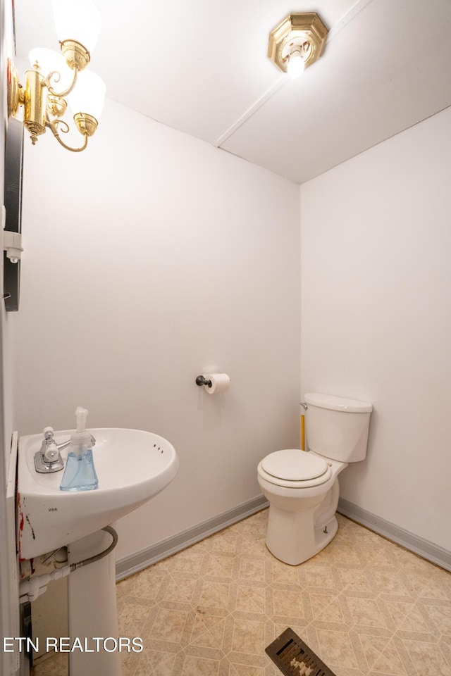 bathroom featuring toilet