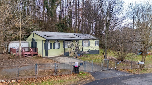 view of front of property with solar panels