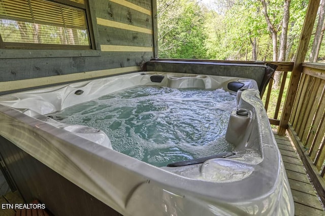 exterior details featuring a hot tub