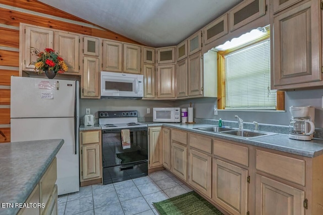 kitchen featuring light brown cabinets, lofted ceiling, white appliances, sink, and light tile patterned flooring