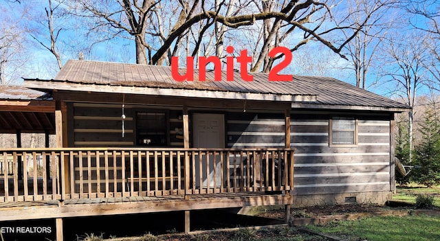 3018 Rivers Edge Dr, Cosby, TN 37722 - rear view of property featuring metal roof and crawl space