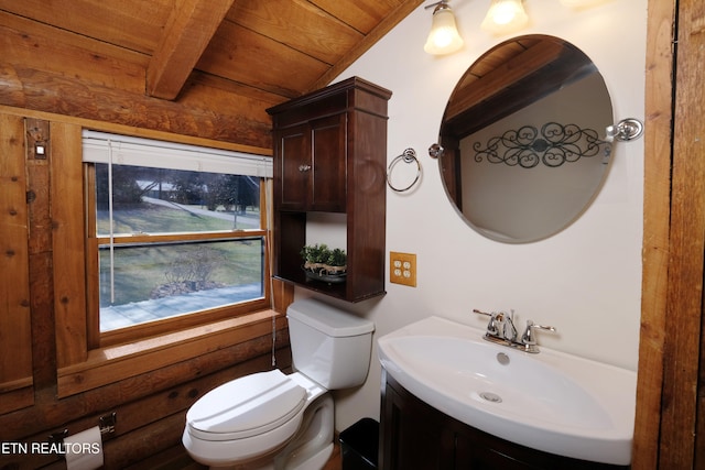 bathroom featuring vaulted ceiling with beams, vanity, toilet, and wooden ceiling