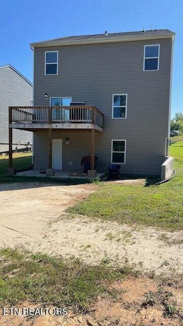 rear view of house with a deck