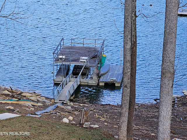 view of dock with a water view