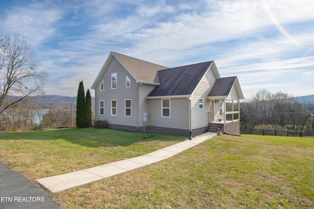 view of home's exterior with a lawn