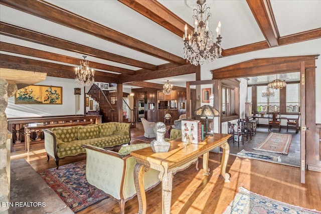 living room with beam ceiling and hardwood / wood-style flooring