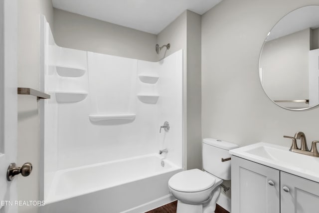 full bathroom with wood-type flooring, vanity, toilet, and shower / tub combination