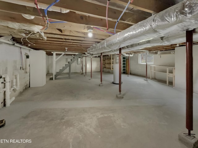 basement featuring gas water heater