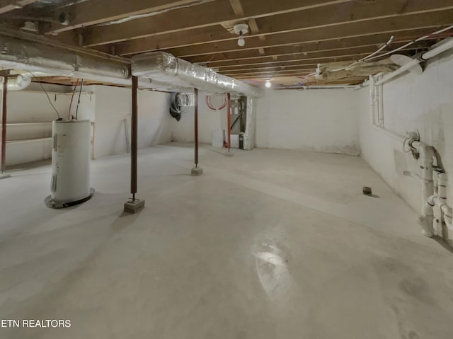 basement featuring electric water heater