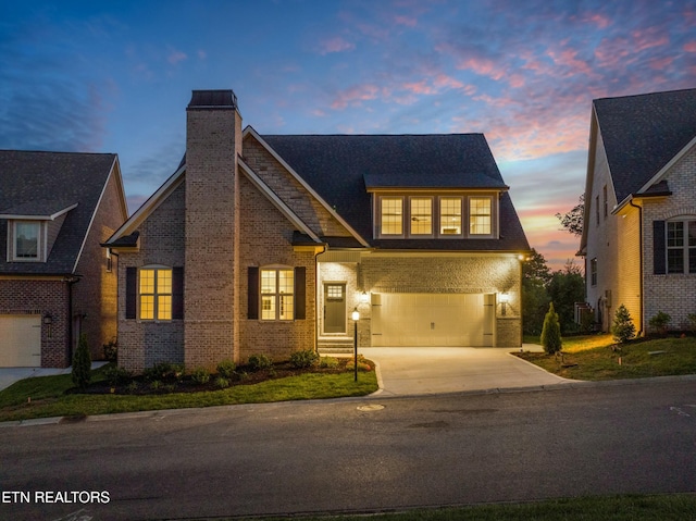 view of front of home with a garage